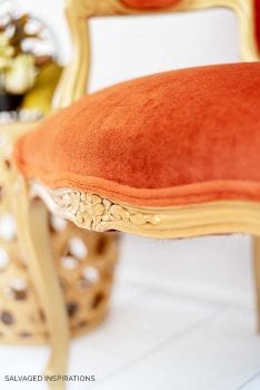 Close Up of Metallic Gold and Velvet Chair
