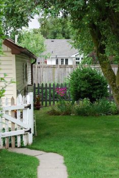 Backyard with Black Painted Picket Fence