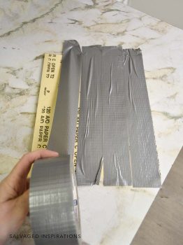 Adding Duct Tape To Back Of Sandpaper