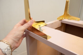 Attaching Gold Legs on Dresser