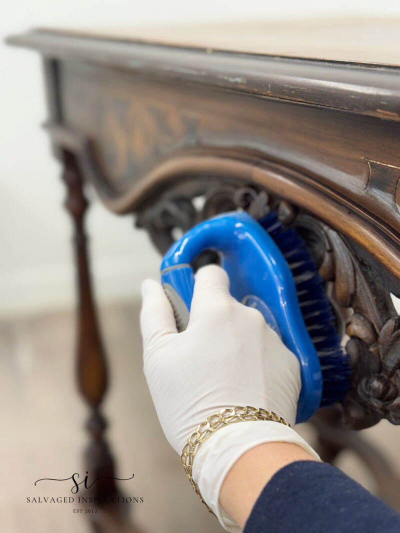 Cleaning Wood Carvings on Table