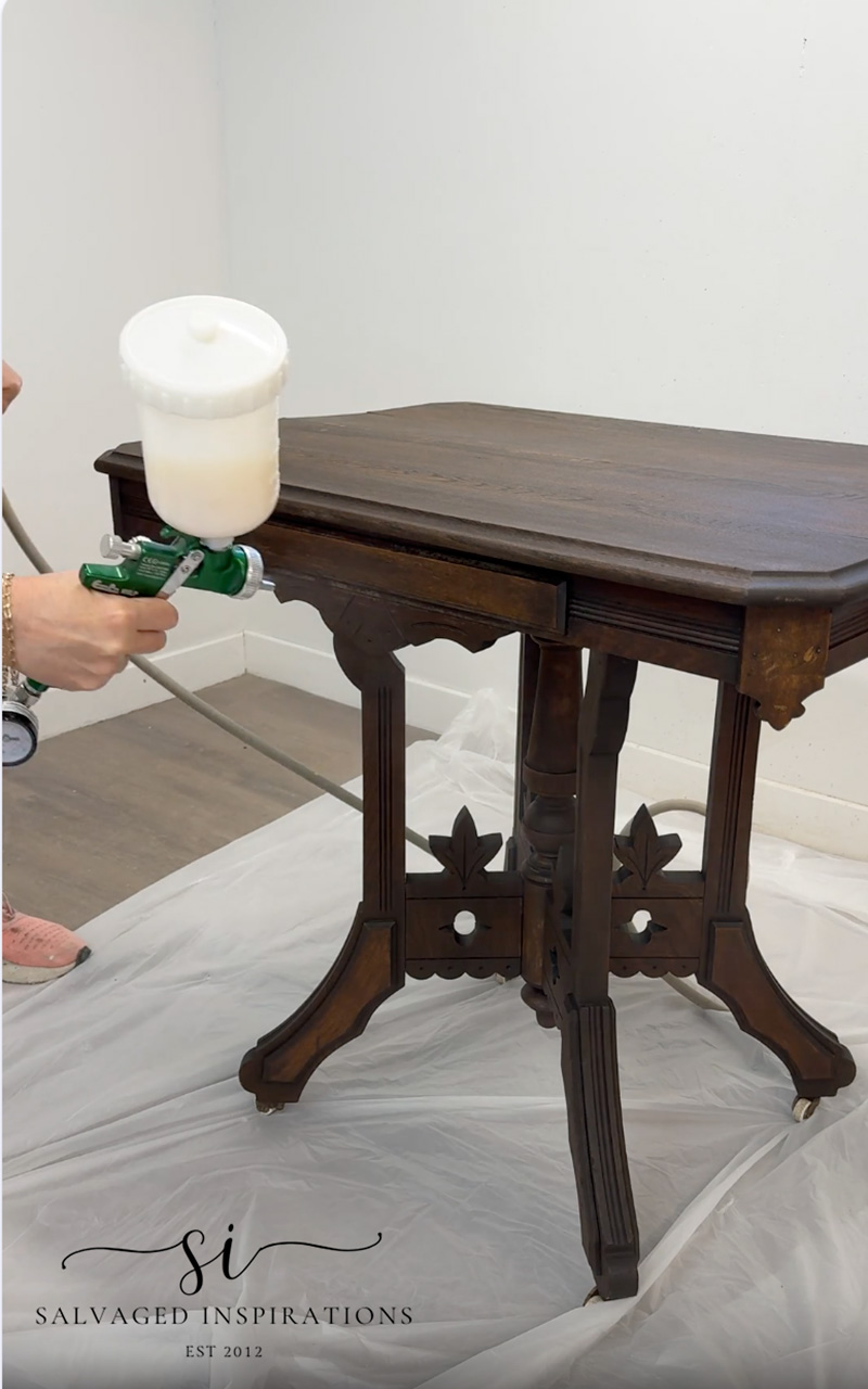 Spraying Topcoat on Stained Eastlake Table