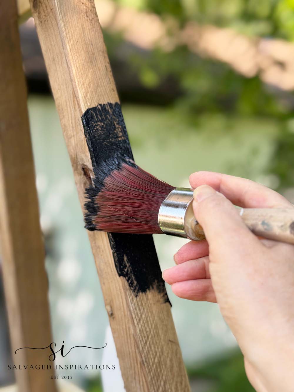 Painting Obelisk in Black Paint